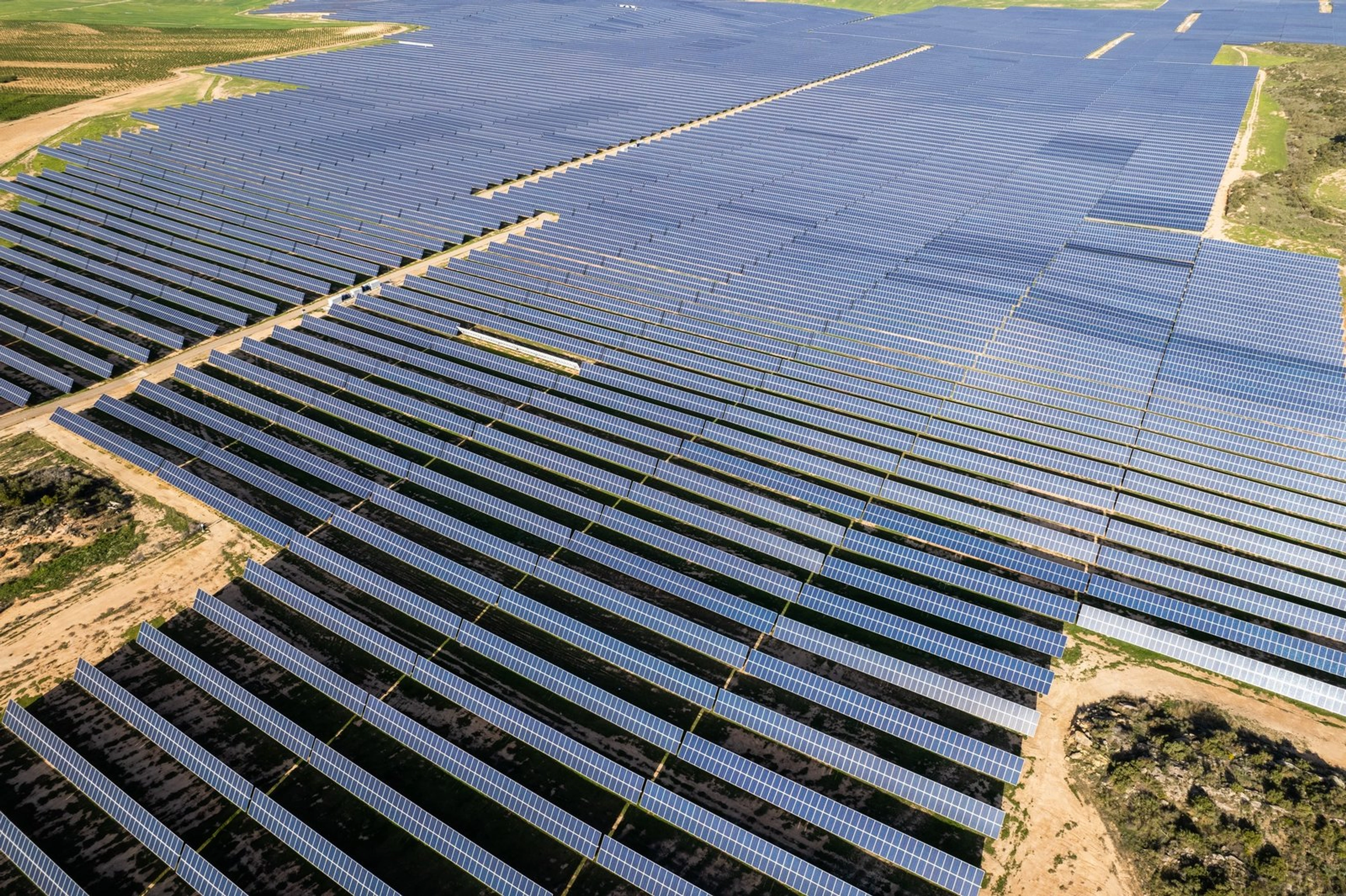 Photovoltaic array shown in the company brochure; grid equipment is explained in the adjoining model