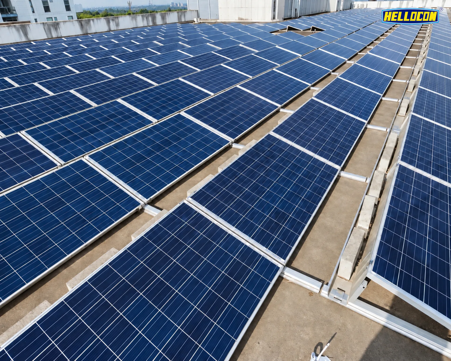 HELLOCON 200 kWp rooftop solar plant in Rourkela, Sundargarh district: rows of panels on ballasted mounts across a concrete roof