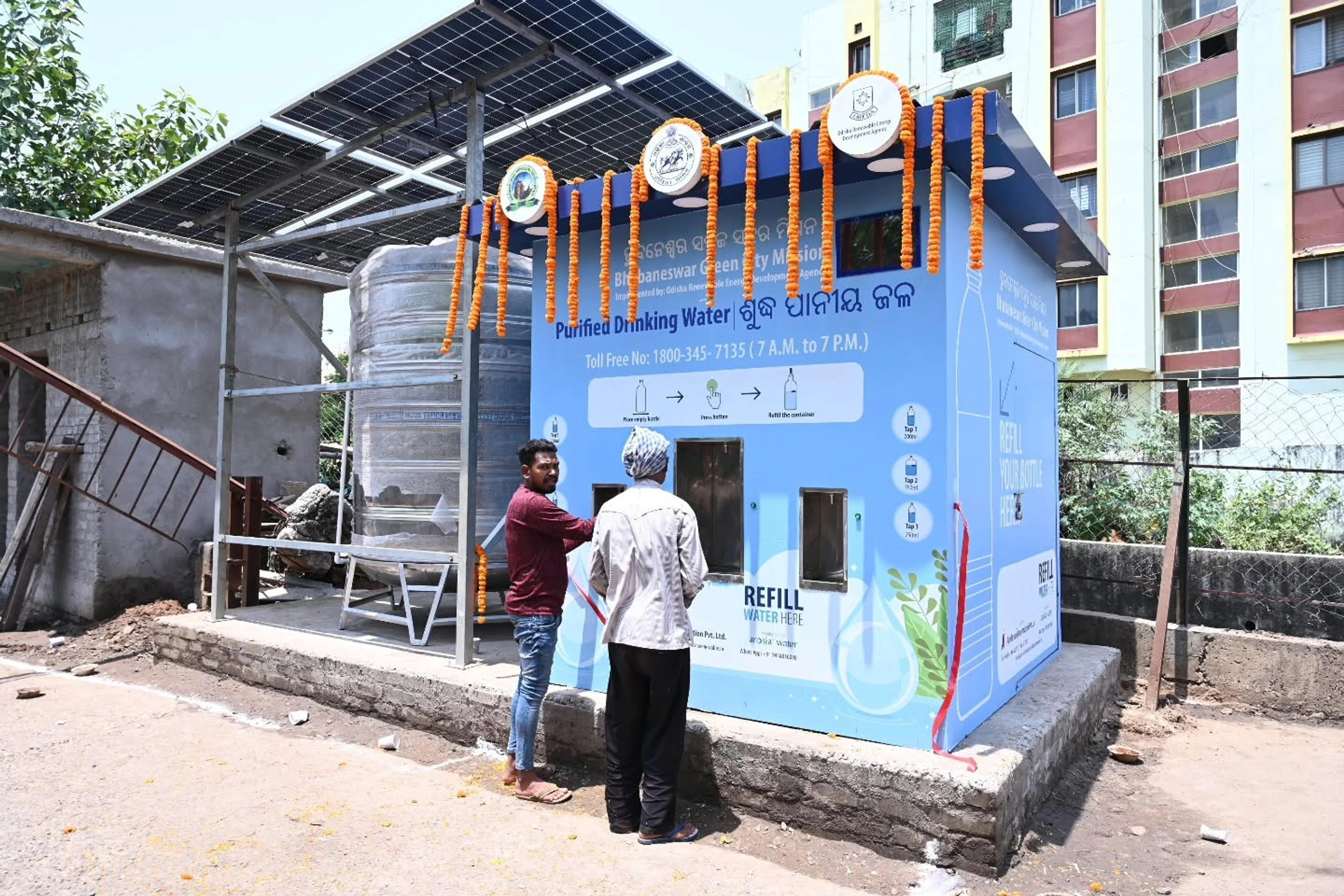 Solar canopy, storage and water dispensing. Owner-supplied installation reference.